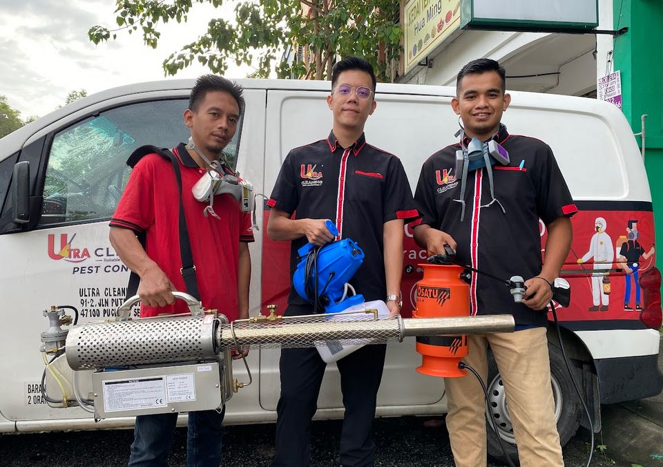 Pest Care team with fogging equipment