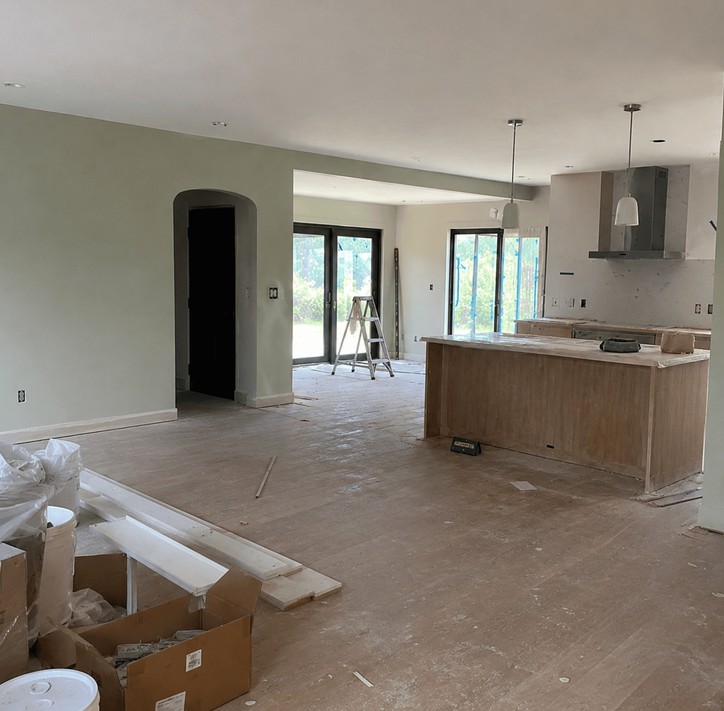 Open-plan living room after renovation before cleaning